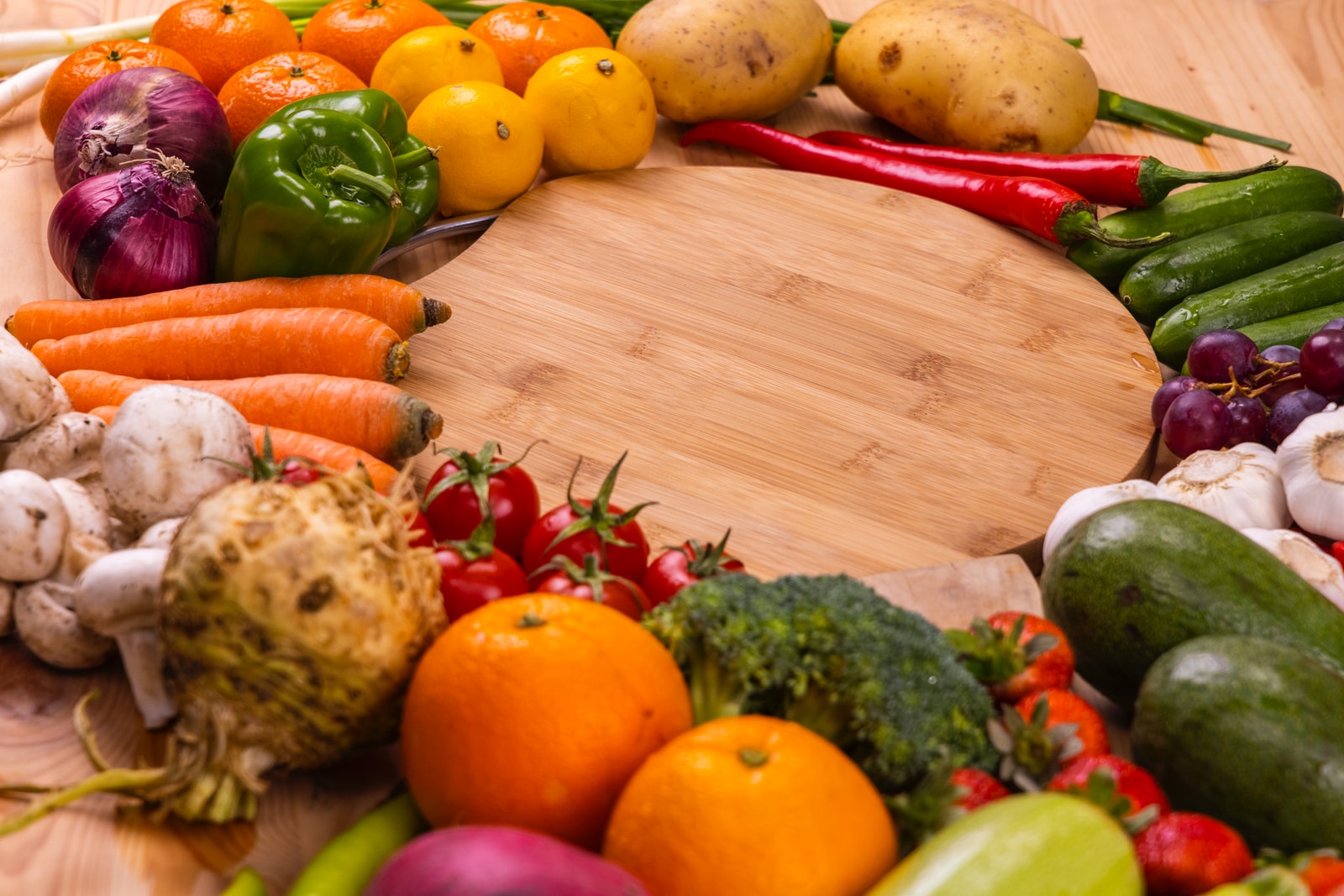 Photo by engin akyurt orange and green vegetables on brown wooden table